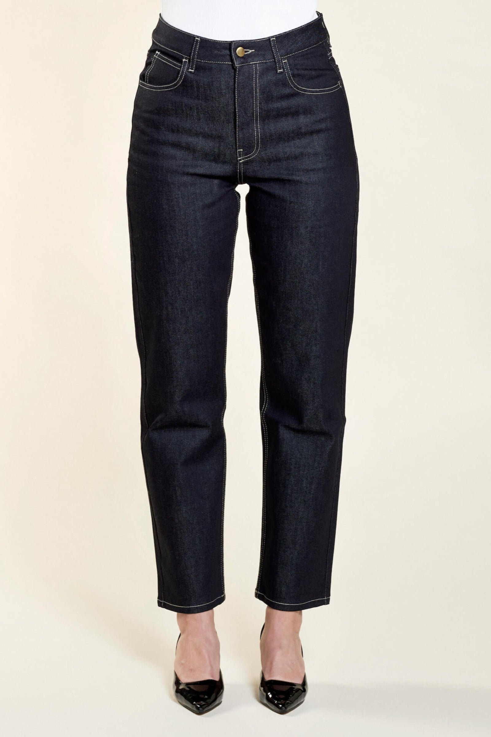 Front view of Cyme Copenhagen's straight-leg dark denim jeans, featuring meticulous stitching and a comfortable fit, epitomizing the brand's Scandinavian design ethos with sustainable fashion.
