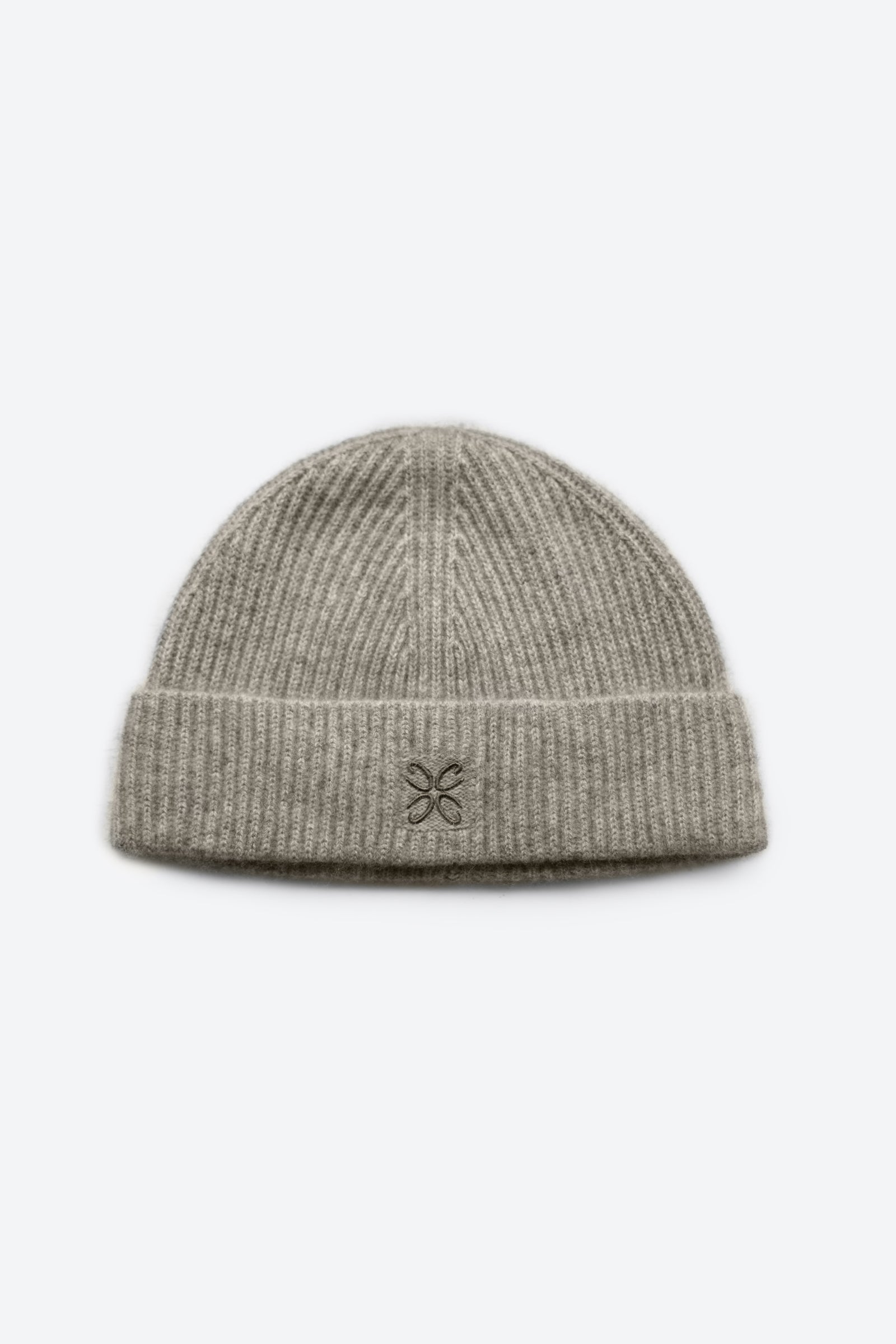 Gray knit beanie with a logo on a light gray background