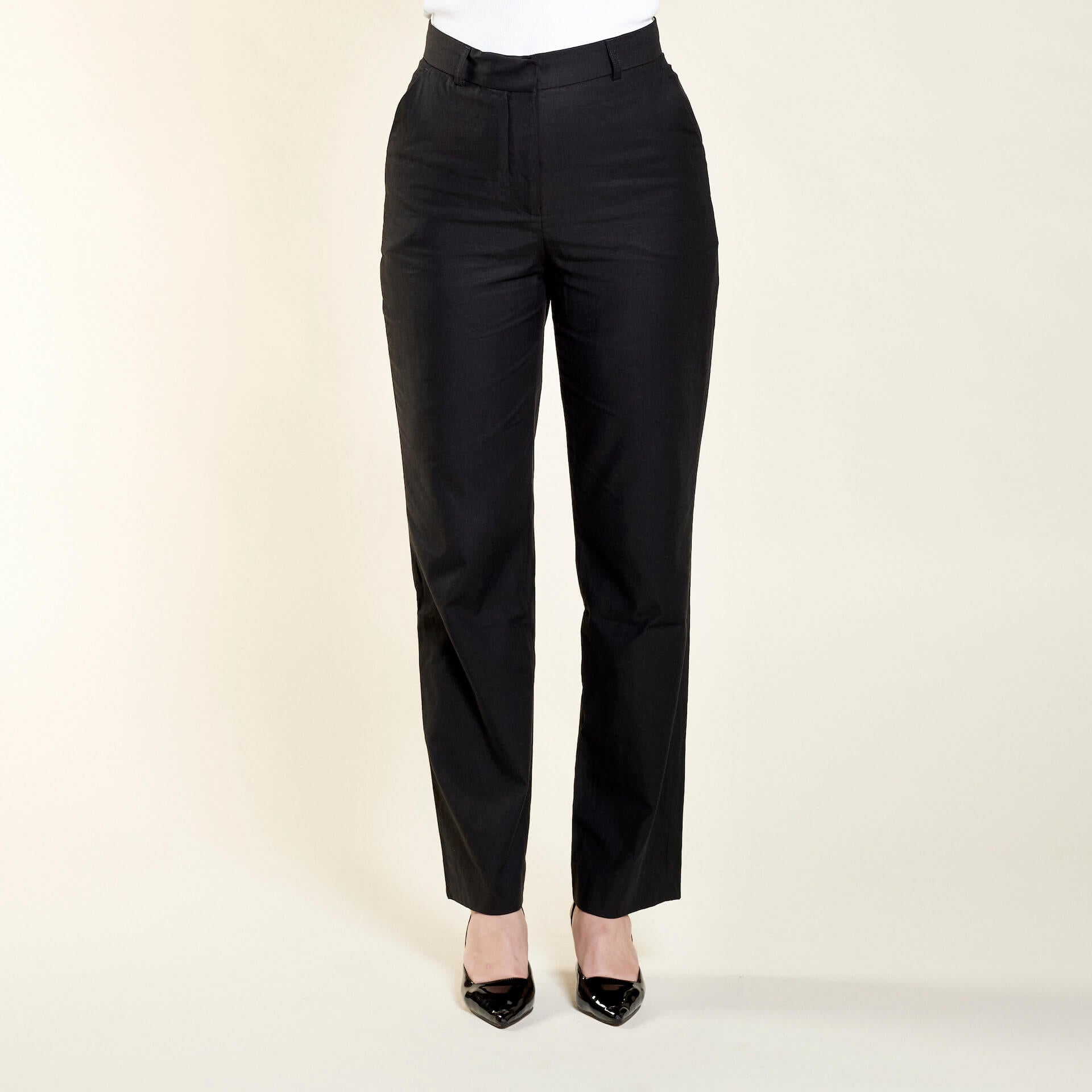 Elegant black trousers from Cyme Copenhagen also available in plus-size, crafted from natural materials like lyocell, demonstrating the brand's commitment to timeless design and sustainable, inclusive fashion.