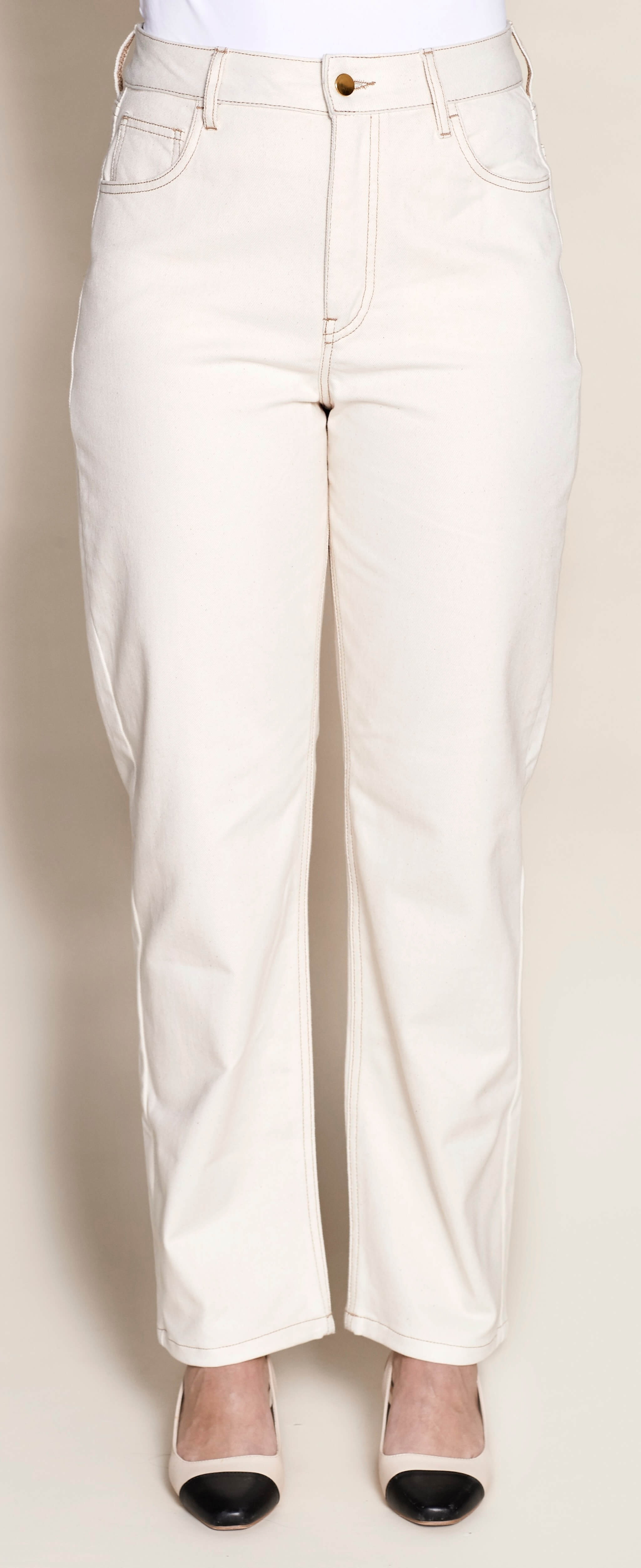 Front view of Cyme Copenhagen's classic cream denim trousers, showcasing the sophisticated cut and sustainable quality materials characteristic of the Danish designer fashion brand.