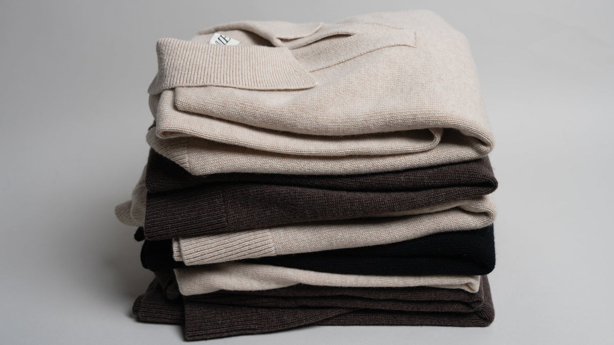 Close-up of CYME knitwear showing the texture and construction of the yarn.