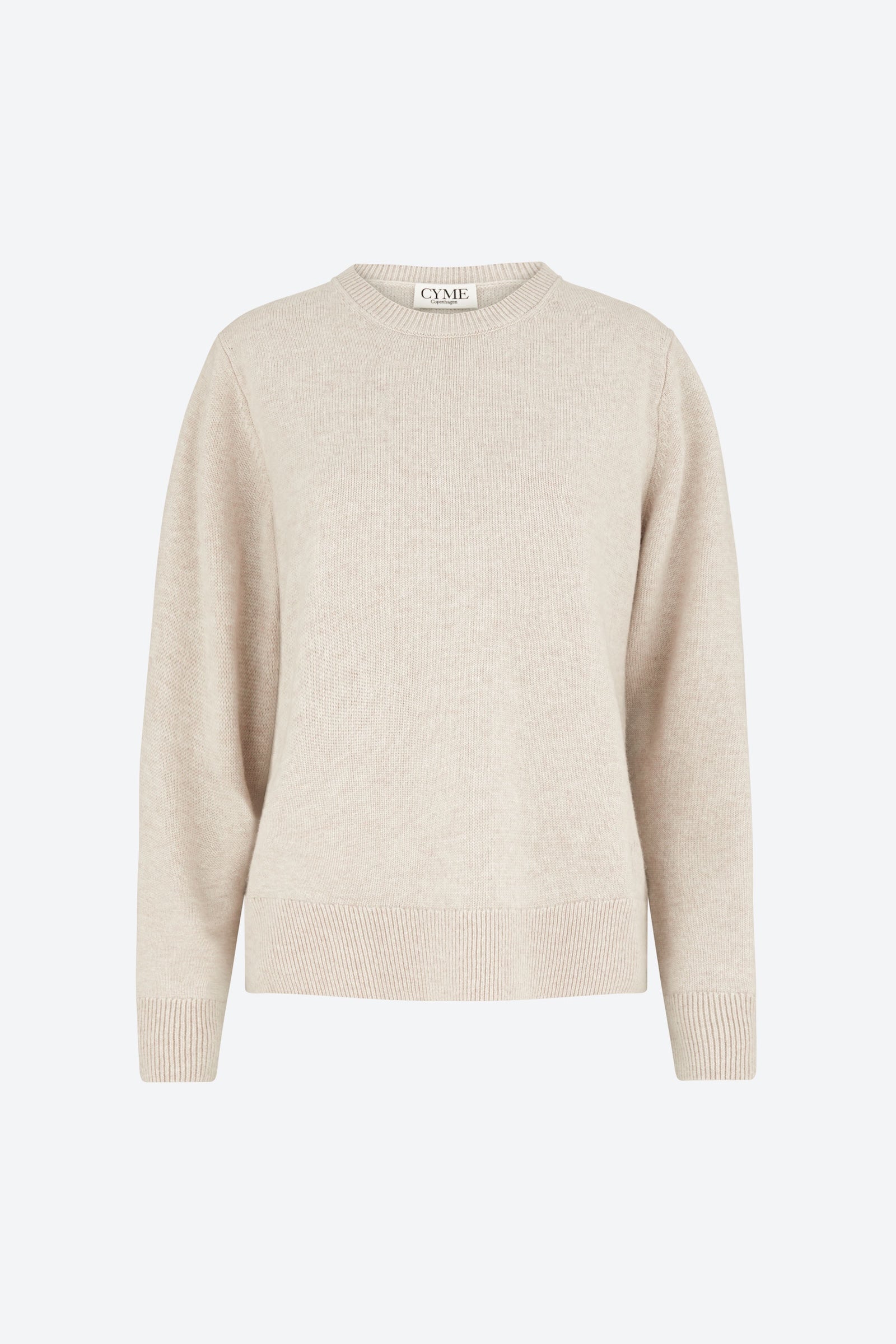 Beige sweater on a white background
