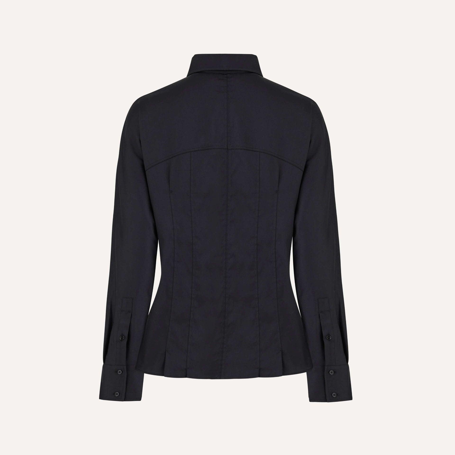 ack view of a black long-sleeve tailored shirt with a structured fit, featuring a pointed collar and buttoned cuffs. The shirt has visible seam lines for a fitted silhouette, displayed on a plain background.