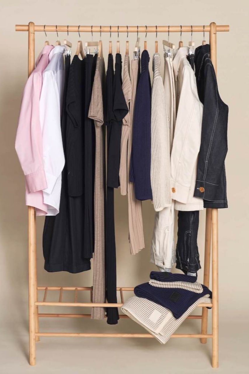 Cyme Copenhagen clothing on a rack, showcasing the timeless collections.