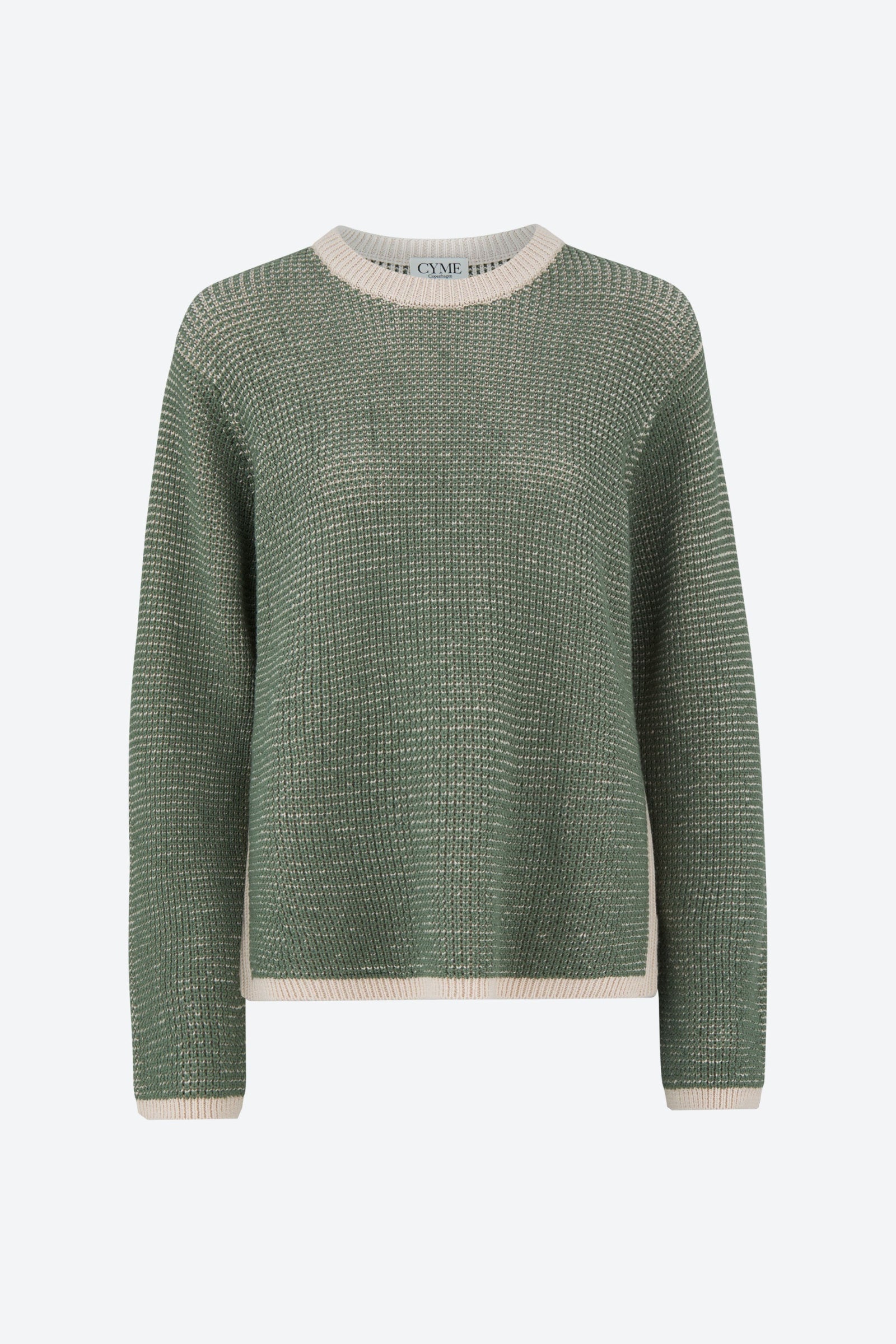 Front view of a green waffle-knit sweater with a contrast white trim at the collar, cuffs, and hem, displayed on a plain background.