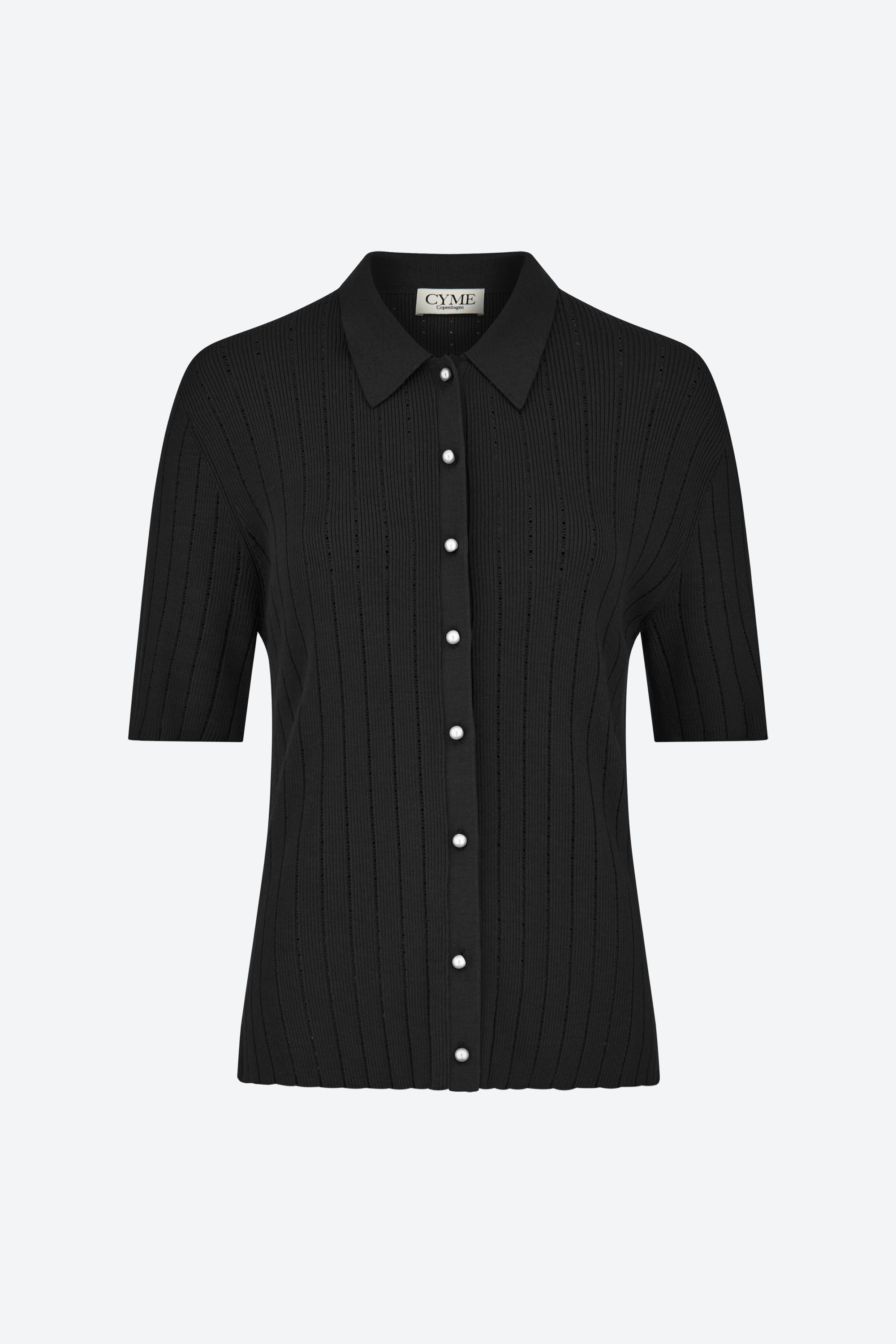 Front view of the CYME Polo Shirt in classic black featuring delicate pearl buttons. Made from a luxuriously soft knit, offering an elevated yet wearable wardrobe essential.