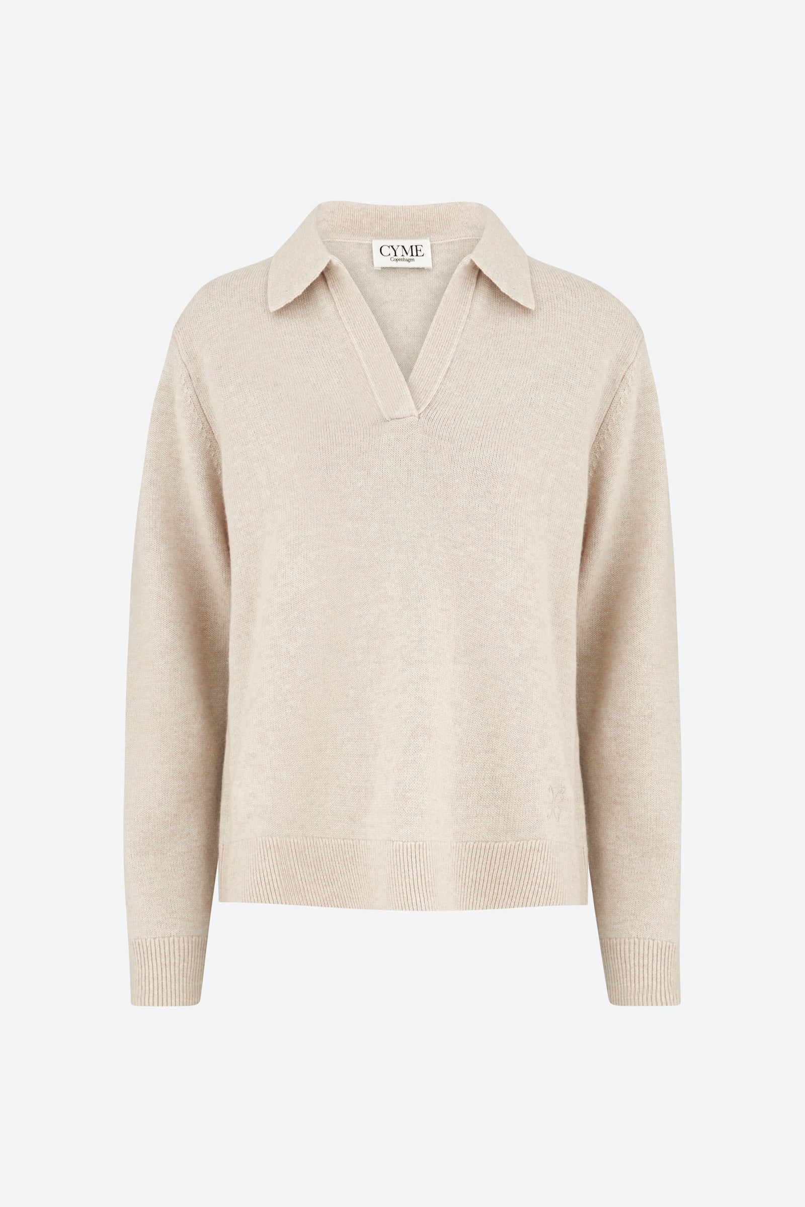 Beige sweater with a collar on a white background